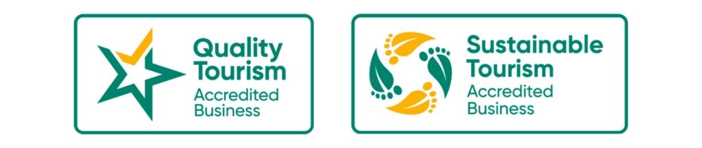 quality tourism accredited business and sustainable tourism accredited business badges. 